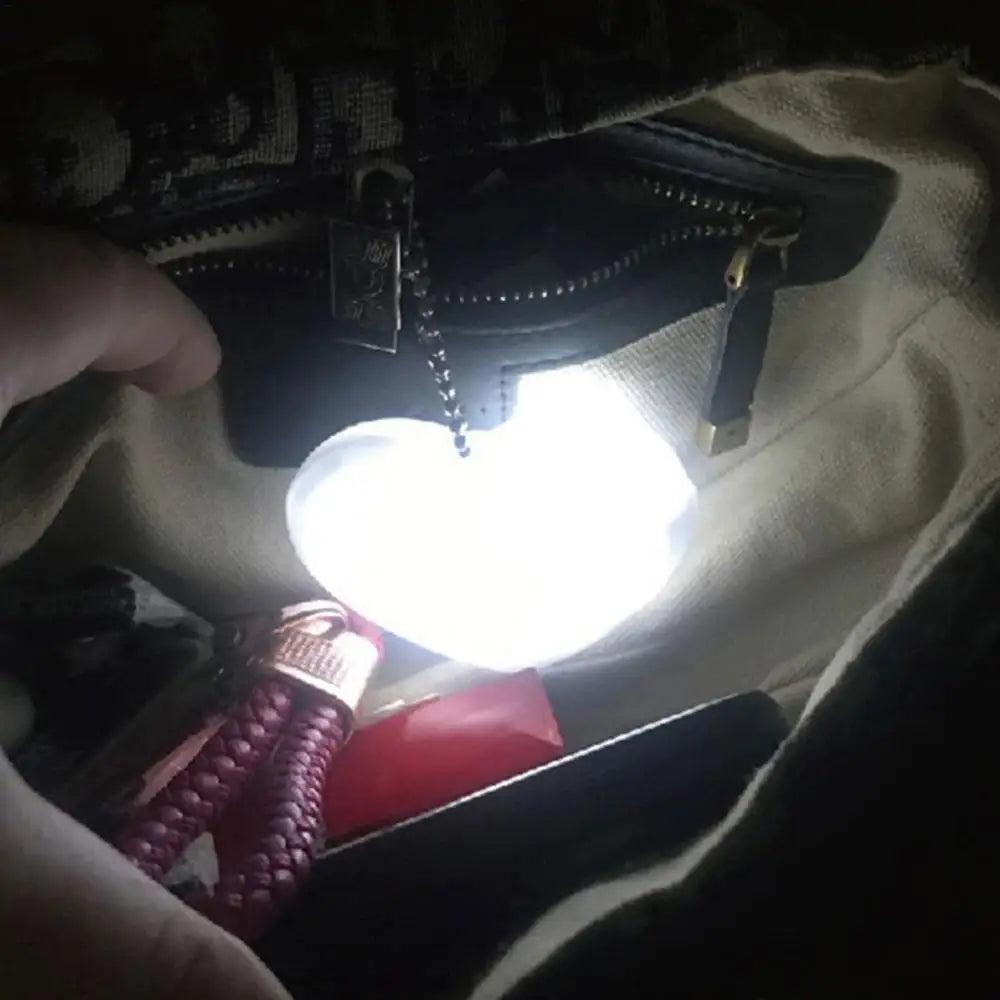 مصباح LED للحقيبة بشكل قلب أو نجمة أو دائرة
يعمل بلمسة،  مثالي كإضاءة ليلية داخل الحقيبة. .